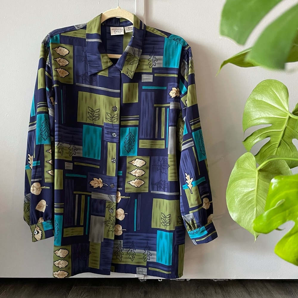 Blue, turquoise, green and leaves patterned shirt.